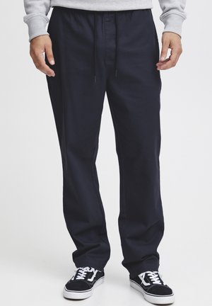 SDGINTE - Trousers - insignia blue