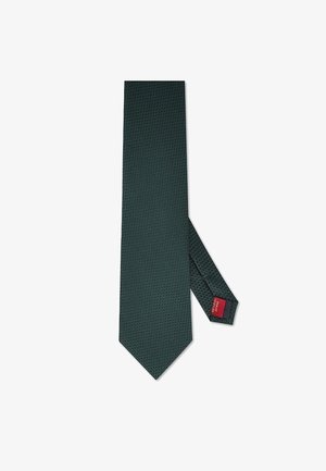 Ciemnozielony krawat z teksturowanym wzorem. Posiada spiczasty koniec i metkę z czerwonym tłem. Wykonany z gładkiej tkaniny.
