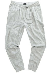 Lysegrå joggerbukser lavet af blødt, struktureret stof. Har elastisk talje med snor, sidelommer og tapered ben design.