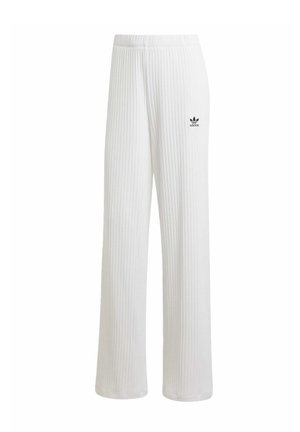 Pantaloni da jogging bianchi a coste con una vestibilità comoda, dotati di una cintura elastica e di un piccolo logo Adidas nero sul lato sinistro.