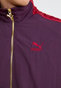 Puma T7  PLAY.LOUD. TRACK - Chaqueta de entrenamiento - midnight plum