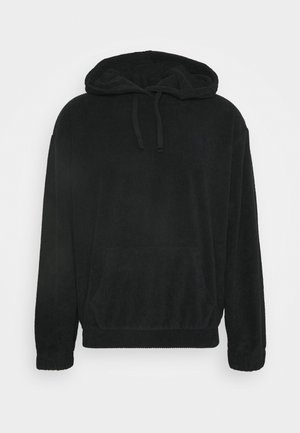 Black corduroy hoodie with long sleeves, front kangaroo pocket, drawstring hood, and elasticated cuffs and hem.