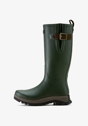 Green rubber rain boot with a tall shaft, textured surface, brown adjustable strap, and a rugged black outsole.