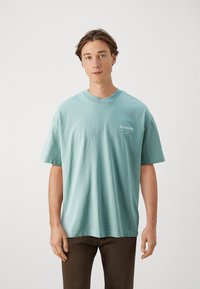 AllSaints UNDERGROUND CREW - T-shirt imprimé - teal green