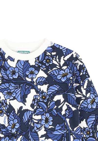 Sweatshirt arboré d'un motif floral bleu sur fond blanc, avec un col rond côtelé et un tissu texturé. Comprend le logo de la marque.