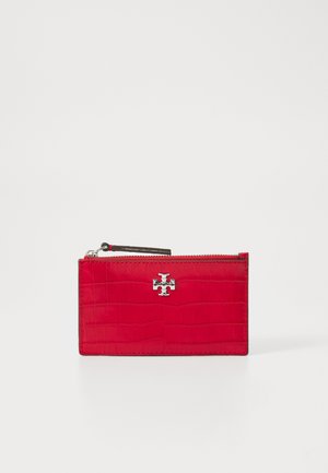 Red leather wallet with a crocodile texture, featuring a silver logo and a zipper closure. Compact rectangular shape, sleek design.