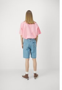 Lee ASHER - Short en jean - bleach wash
