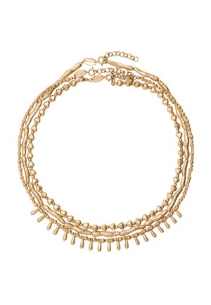 Naszyjnik warstwowy w złotym odcieniu, z różnorodnymi kształtami koralików, teksturowanymi ogniwami oraz delikatnym łańcuszkiem z zapięciem typu sprężynka i przedłużką.