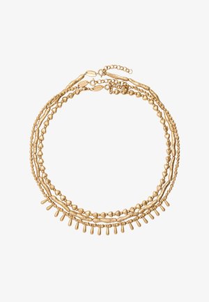Naszyjnik warstwowy w złotym odcieniu, z różnorodnymi kształtami koralików, teksturowanymi ogniwami oraz delikatnym łańcuszkiem z zapięciem typu sprężynka i przedłużką.