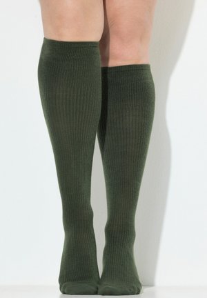 Calze a coste al ginocchio di colore verde scuro. Realizzate in materiale morbido con una texture liscia, presentano un design aderente per il comfort.