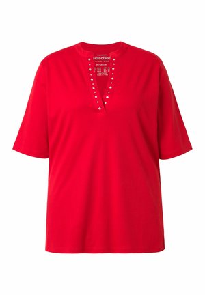 Red short-sleeve blouse with a V-neckline adorned with small silver studs, made from soft cotton fabric.