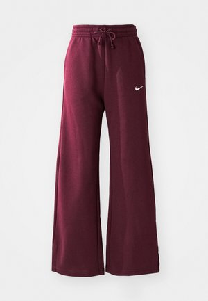 Bordeaux wijde sweatpants van zachte stof, met een elastische tailleband met trekkoord en een wit Nike-logo aan de linkerkant.