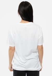 Paradiso Clothing THE STROKES DISTRESSED MAGNA LOGO - Print T-shirt - white