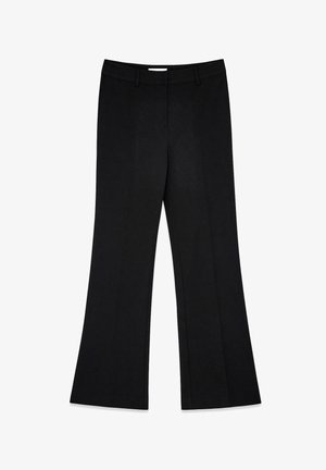 Pantaloni neri a vita alta, sartoriali, con passanti per cintura, chiusura frontale con zip e gambe leggermente svasate, distesi su uno sfondo bianco.