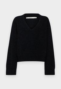 Schwarzer, kurzer Pullover mit V-Ausschnitt und langen Ärmeln. Aus weichem Stoff mit strukturiertem Finish gefertigt. Minimalistisches Design, keine sichtbaren Beschläge.