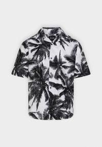 Chemise à manches courtes avec boutons, arborant un motif de palmiers noirs et blancs sur un fond clair, confectionnée en tissu léger.