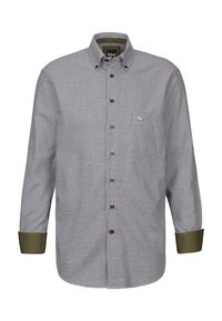 Camicia a quadri bianca e nera con polsini verdi oliva. Presenta un colletto standard e bottoni blu. Tessuto morbido.