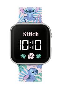 Orologio digitale con quadrante nero quadrato. Il bracciale presenta uno sfondo rosa chiaro con disegni del cartone animato Stitch e motivi di foglie tropicali.
