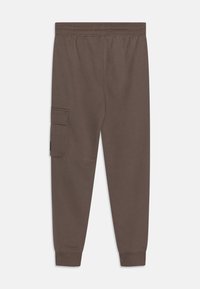 Calvin Klein Jeans BADGE RELAXED PANTS - Tepláky - beige