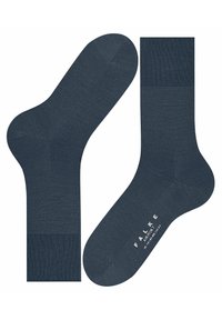 Dunkelblaue Socken aus weichem, strukturiertem Gewebe, mit gerippten Bündchen und verstärkten Zehen, mit Branding auf der Sohle.
