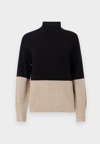 Pull à col roulé en noir et beige, avec une texture côtelée, un design en blocs de couleur et des manches longues. Finition droite.