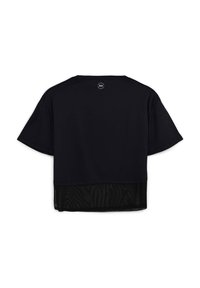 T-shirt cropped nera con maniche corte, dotata di un retro in mesh. Logo circolare sul collo. Tessuto morbido e liscio con una vestibilità rilassata.
