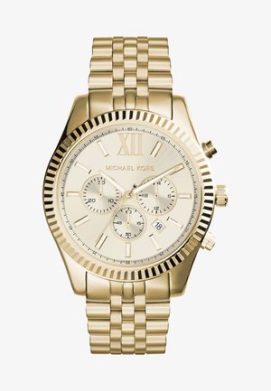 Złoty zegarek Michael Kors z okrągłą tarczą, rzymskimi cyframi, trzema sub-tarczami i polerowaną bransoletą ogniwową. Okienko daty na godz. 6.