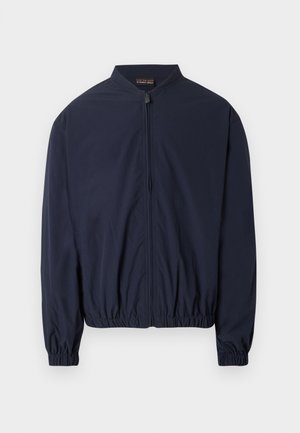 Veste bomber légère bleu marine avec fermeture éclair frontale, poignets élastiques et ourlet élastique, présentée sur un fond blanc.