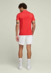 Wilson PLAYERS TEAM - Polo - infrared