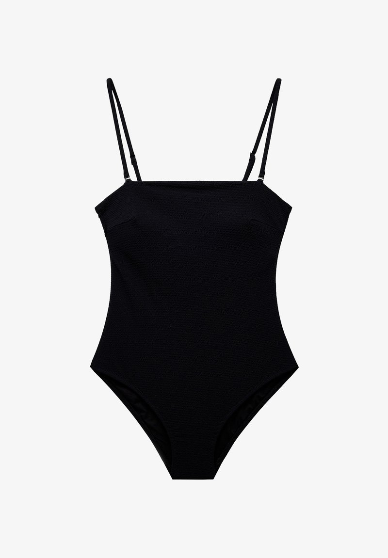 Sort ét stykke badetøj med tynde stropper, der har en glat overflade og et minimalistisk design, struktureret til at sidde behageligt.