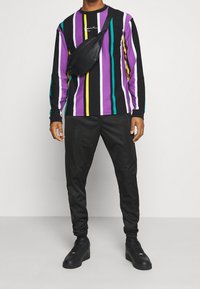 Ellesse Träningsbyxor - black