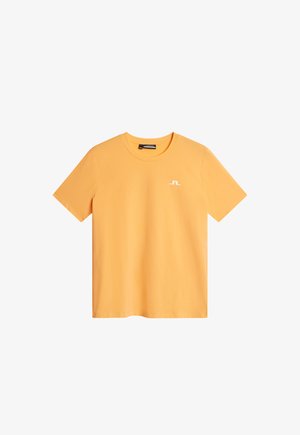 Korte mouw t-shirt in feloranje katoen met een ronde halslijn en een klein wit logo op het linkerdeel van de borst. Gladde textuur.