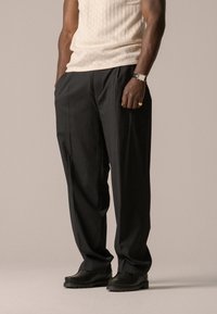 BLKVIS - SCRIPT TROUSERS UNISEX - Trousers - black Thumbnail Image 1