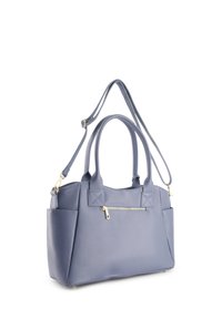 Light blue leather handbag with dual handles and removable shoulder strap. Features a front zip pocket and textured finish. Gold-tone hardware accents.