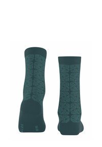 Para ciemnoturkusowych skarpet za kostkę z teksturowanym wzorem liści, biegnącym pionowo od mankietu do pięty.