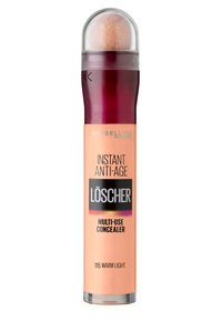 Maybelline Instant Anti-Age Multi-Use Concealer in 115 Warm Light. Bottiglia cilindrica con un design rosa e pesca e un applicatore arrotondato e morbido.