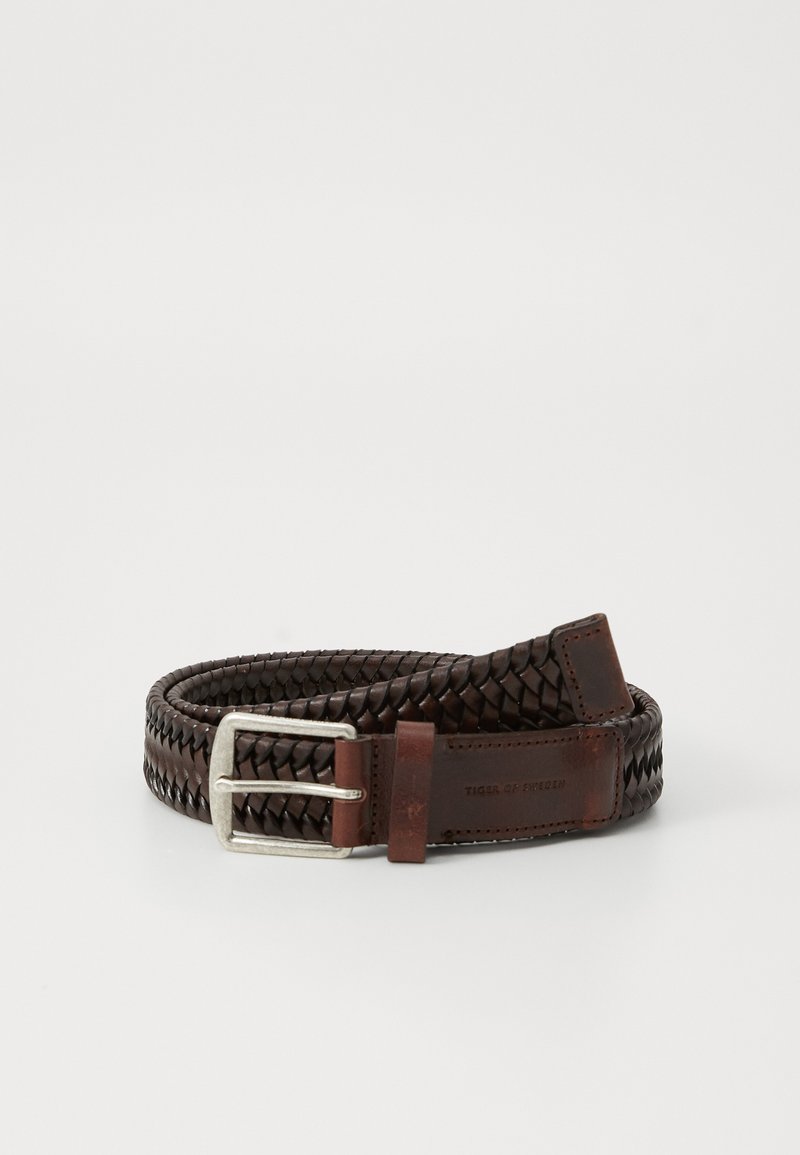 Woven brown leather belt featuring a silver metal buckle and a branded leather accent. Textured details enhance the design.