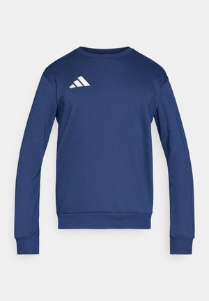 Temno modra jopa z dolgimi rokavi, okroglim izrezom, rebrastimi manšetami in belim logotipom Adidas na levi rami. Gladek tekstura.