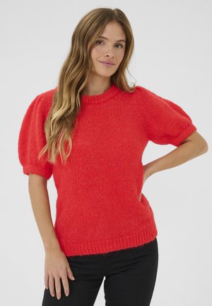 Pull en tricot rouge avec des manches courtes bouffantes, col rond et tissu texturé. Doté d'une coupe décontractée et d'un ourlet côtelé.
