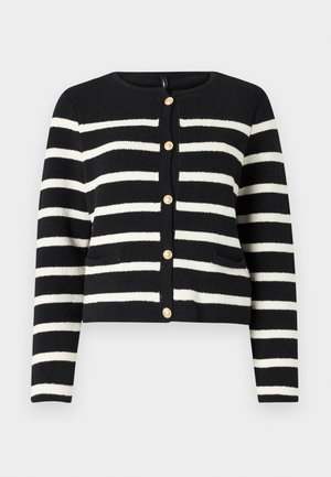 Cardigan rayé noir et blanc avec un col rond, boutons dorés sur le devant et deux poches avant. Tissu en maille texturée.