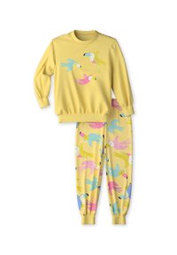 Geel pyjama set met een langärmige top met vogelontwerpen en bijpassende broek met een kleurrijk vogelpatroon. Zachte, lichte stof.