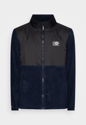 Marinefarbener Reißverschlussjacke mit schwarzem gepolstertem oberen Bereich, weichem Fleece-Unterteil, hohem Kragen und Logopatch auf der Brust.