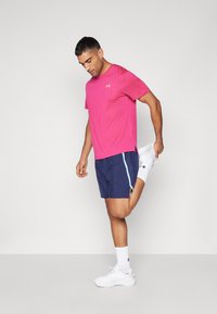 Under Armour LAUNCH - Sports shorts - midnight navy/stream