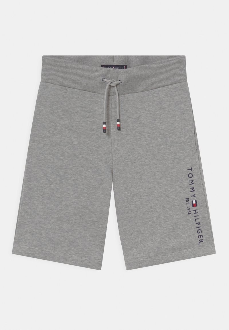 Shorts en maille gris avec taille à cordon et logo Tommy Hilfiger avec drapeau et texte sur la jambe droite.