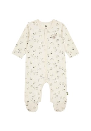 Cream-colored baby onesie with long sleeves, feet covers, all-over small animal prints, and a teddy bear face patch on the chest.