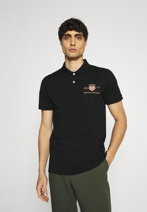 ARCHIVE SHIELD - Polo - black