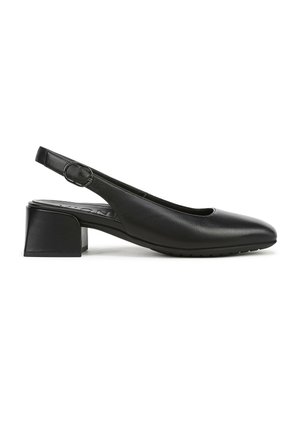 Chaussure à bride arrière noire, en cuir lisse avec un bout arrondi, un petit talon carré et un détail boucle circulaire sur la bride réglable.