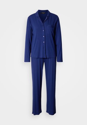 Marineblauw pyjama-set met een overslagtop, lange mouwen en een borstzakje, gecombineerd met bijpassende lange broek van een zachte, gestructureerde stof.