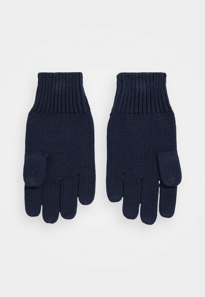 Stickade handskar i marinblått med ribbstickade muddar. Har design med fem fingrar, mjuk textur och ett tumområde för enkel användning.