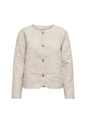 Quilted beige jacket featuring a round neckline, long sleeves, and decorative leaf patterns with snap-button closure.
